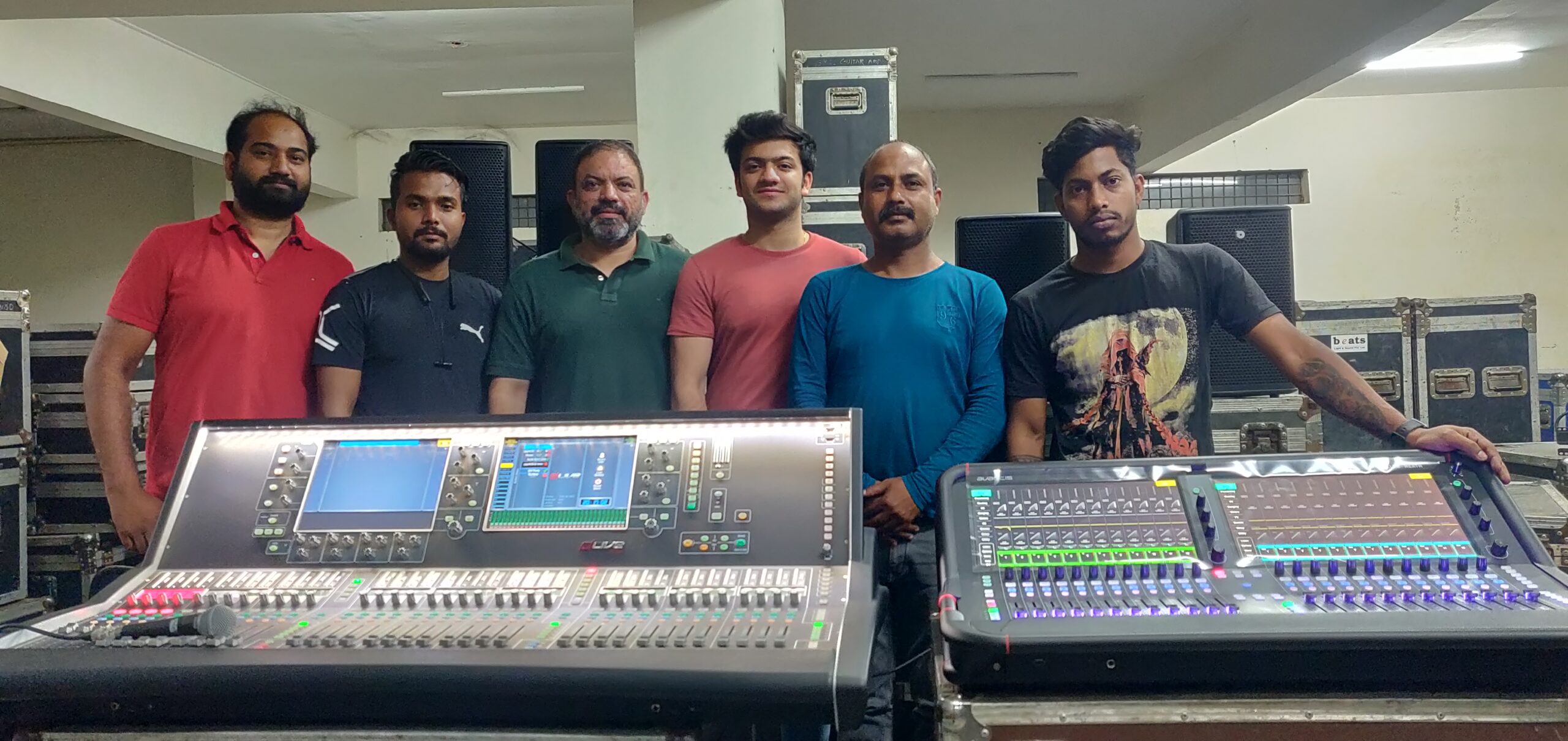The Beats Light & Sound team with the dLive S7000 Surface and Avantis console.